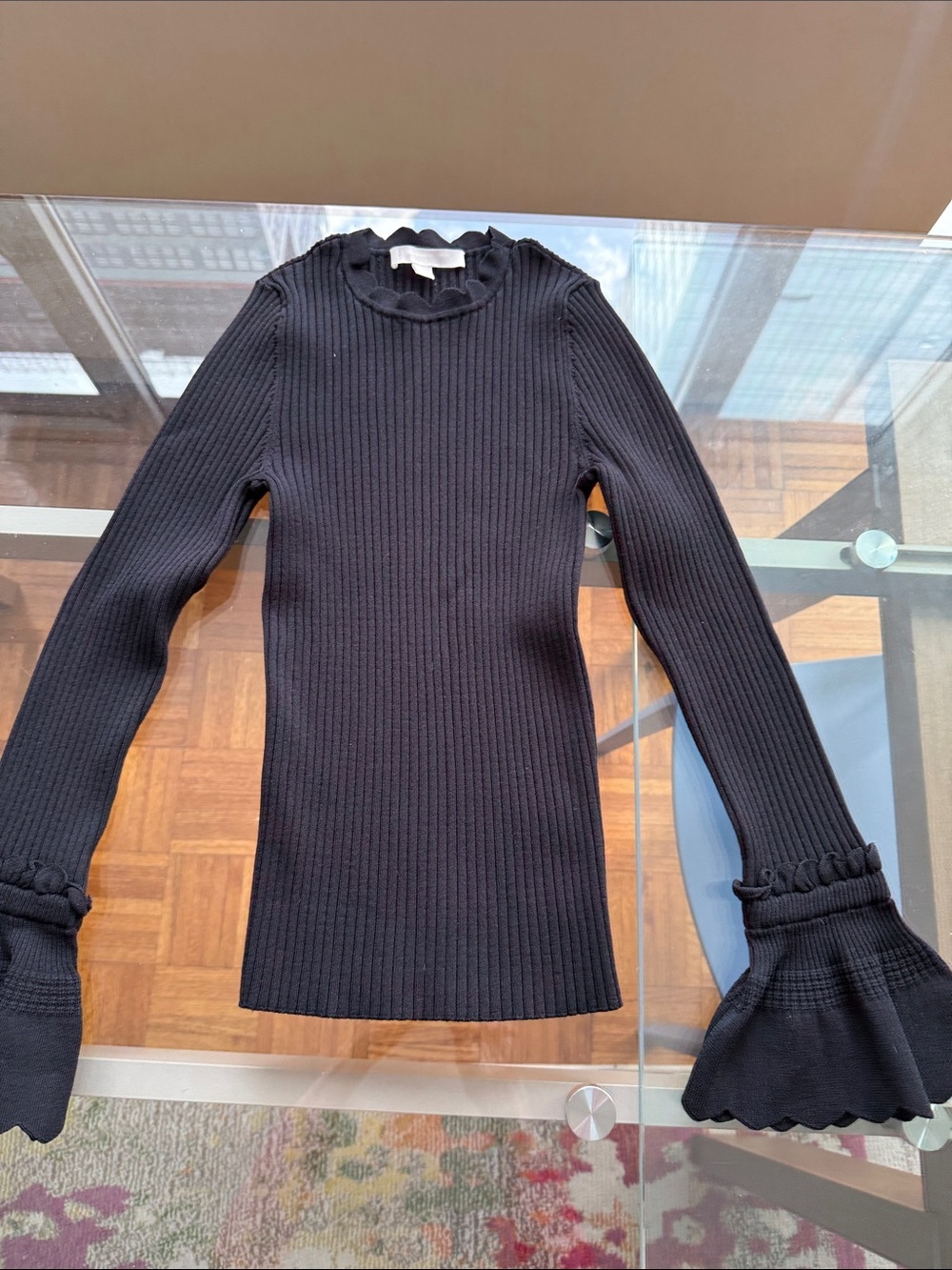 Jonathan Simkhai Ribbed Knit Long Sleeve Top Accented with a Ruffle. Size Small.